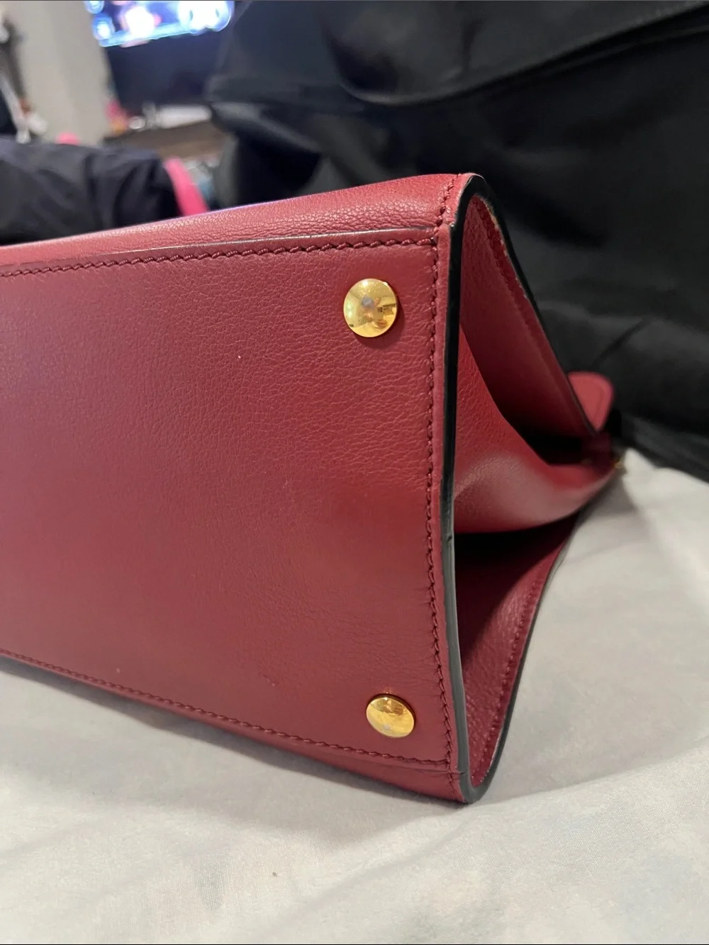 Burberry Red Leather Satchel with Gold Grommet Accents